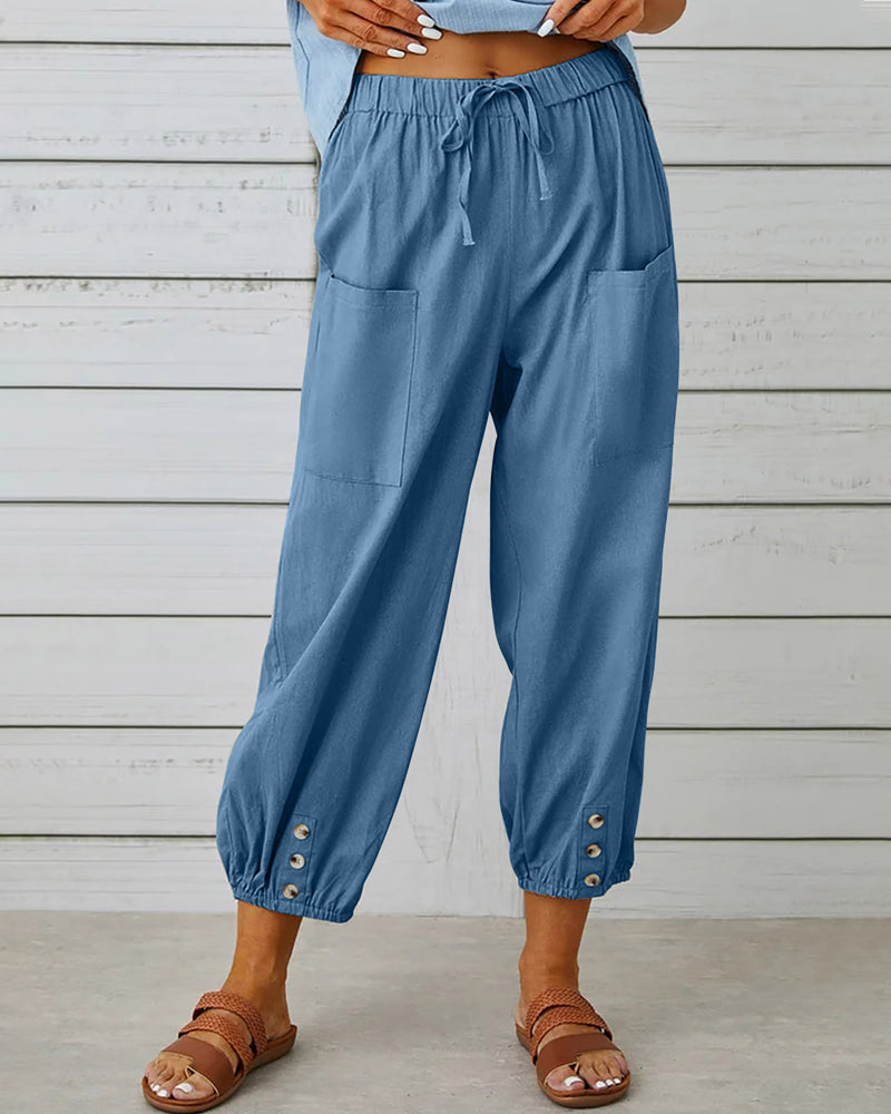 Moderne casual damesbroek voor herfst, hoge taille, rechte pijpen, met unieke knoopdetails.