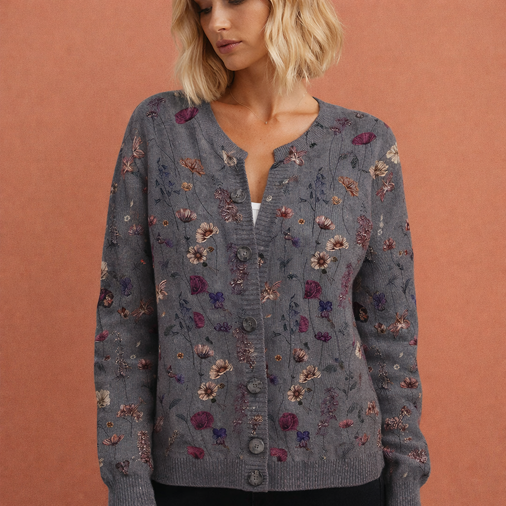 Stijlvolle dames cardigan met verfijnde bloemenprint, warm en chique voor wintermode.