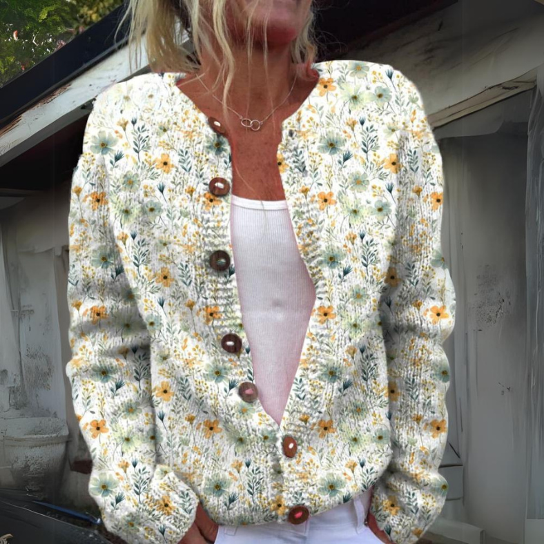Trendy dames vest met levendige bloemenprint. Comfortabel, veelzijdig en stijlvol, perfect voor elke modebewuste vrouw.