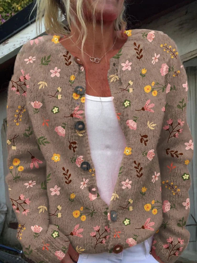 Stijlvolle dames cardigan met bloemenprint, comfortabel en trendy. Verkrijgbaar in diverse maten, ook plus size.