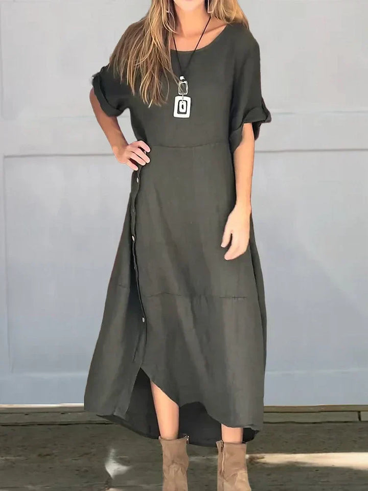 Modieuze dames midi blouse jurk, comfortabel en elegant, met een veelzijdige losse pasvorm voor vrouwen.