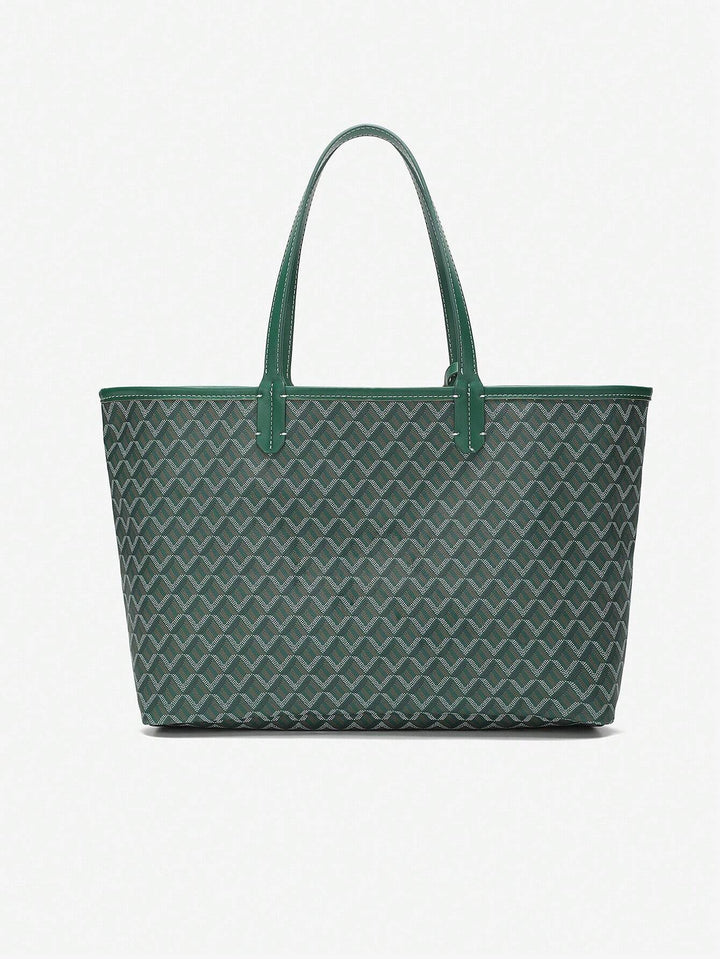 Moderne dames handtas van PVC, ruime casual tote bag met comfortabele schouderbanden.