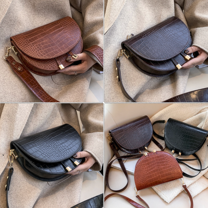 Compacte dames crossbody tas met zwarte krokodillenprint, veilig en stijlvol voor onderweg.
