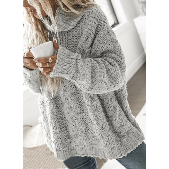 Dames coltrui met kabelbreipatroon en losvallend ontwerp. Comfortabele gebreide trui voor herfst & winter.