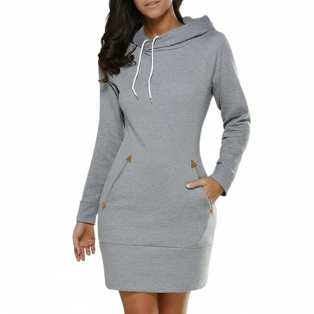 Dames comfort hoodie jurk met lange mouwen en handige zijzakken. Ideaal voor casual herfst- en wintermode.