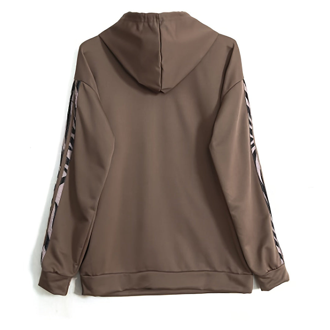 Veelzijdig dames tweedelig trainingspak set met hoodie en broek. Comfortabel voor casual gebruik of lichte sportactiviteiten.