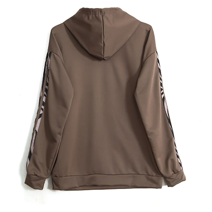 Veelzijdig dames tweedelig trainingspak set met hoodie en broek. Comfortabel voor casual gebruik of lichte sportactiviteiten.