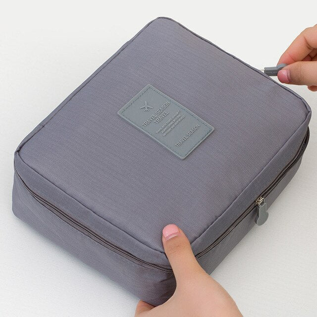 Dames reisgenoot: compacte waterdichte make-up reistas met handige vakken.
