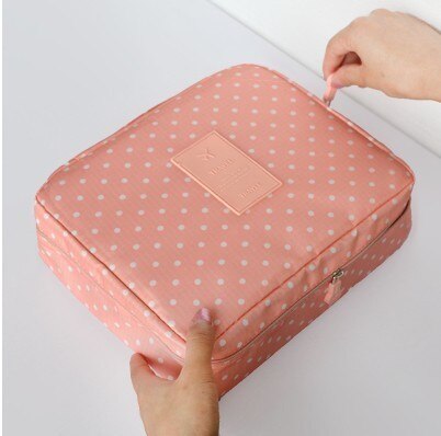 Compacte make-up organizer met waterdichte rits, perfecte reistas voor dames.
