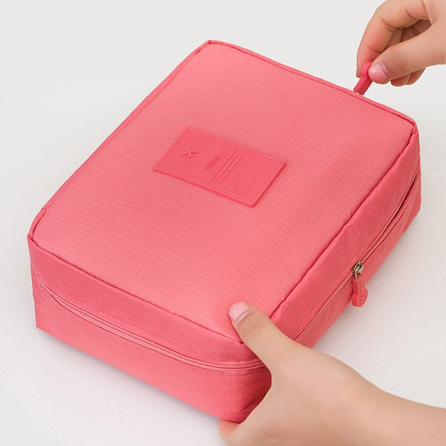 Stijlvolle waterdichte dames reistas voor make-up, compact en praktisch voor onderweg.