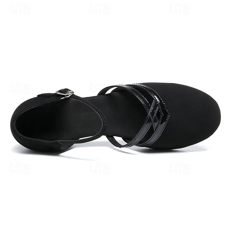 "Dames dansschoenen, comfortabel, flexibel voor moderne dans, elegante lage hak, ronde teen, zwarte afwerking."