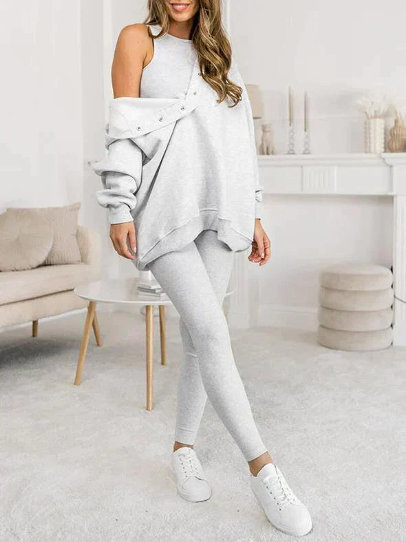 Comfortabele thuisoutfit: oversized hoodie, bijpassende top & slim fit leggings dames.