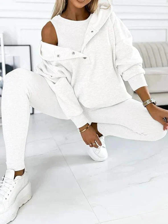 Dames loungewear set met ruime hoodie, effen top en comfortabele leggings; jouw casual stijl thuis.
