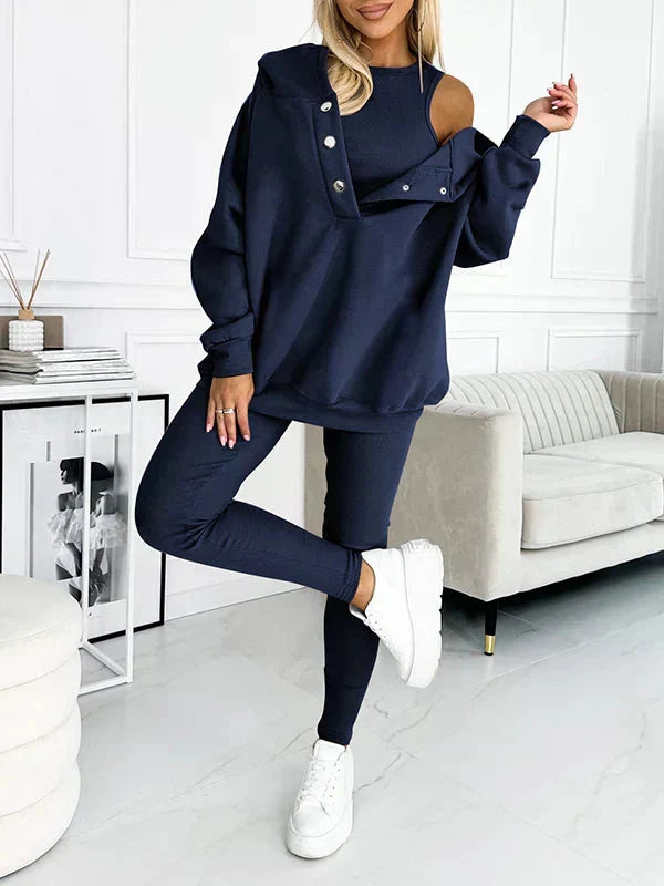 Luxe dames comfort kleding: driedelige set met capuchon, mouwloze top en nauwsluitende legging.