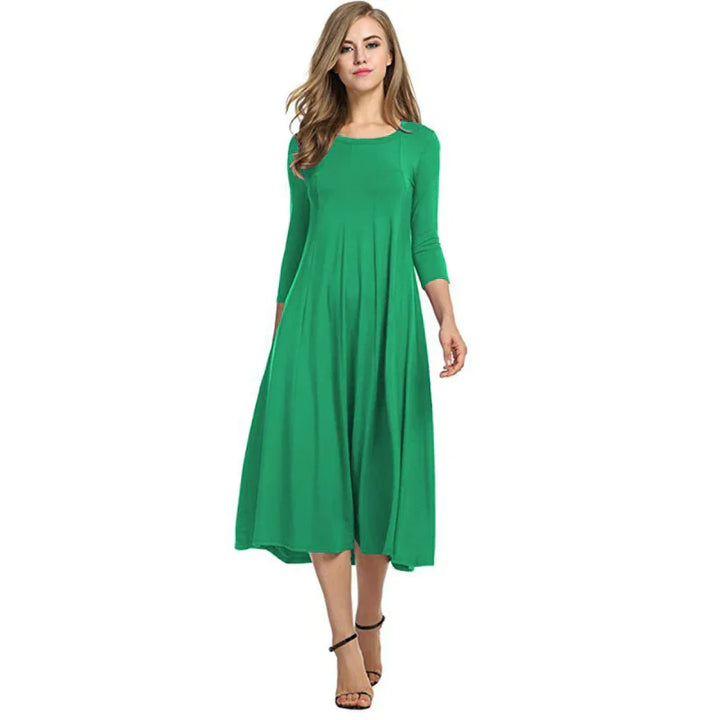 Midi lengte dames zomerjurk, stijlvol en comfortabel. Perfecte driekwart jurk voor de zomermode collectie.