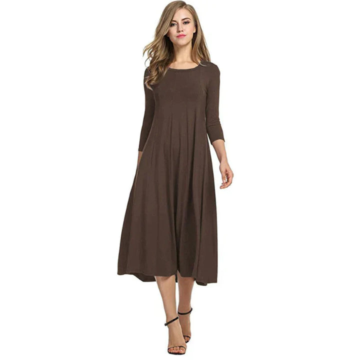 Veelzijdige dames zomerjurk, driekwart midi lengte. Stijlvol, comfortabel en geschikt voor elke gelegenheid.
