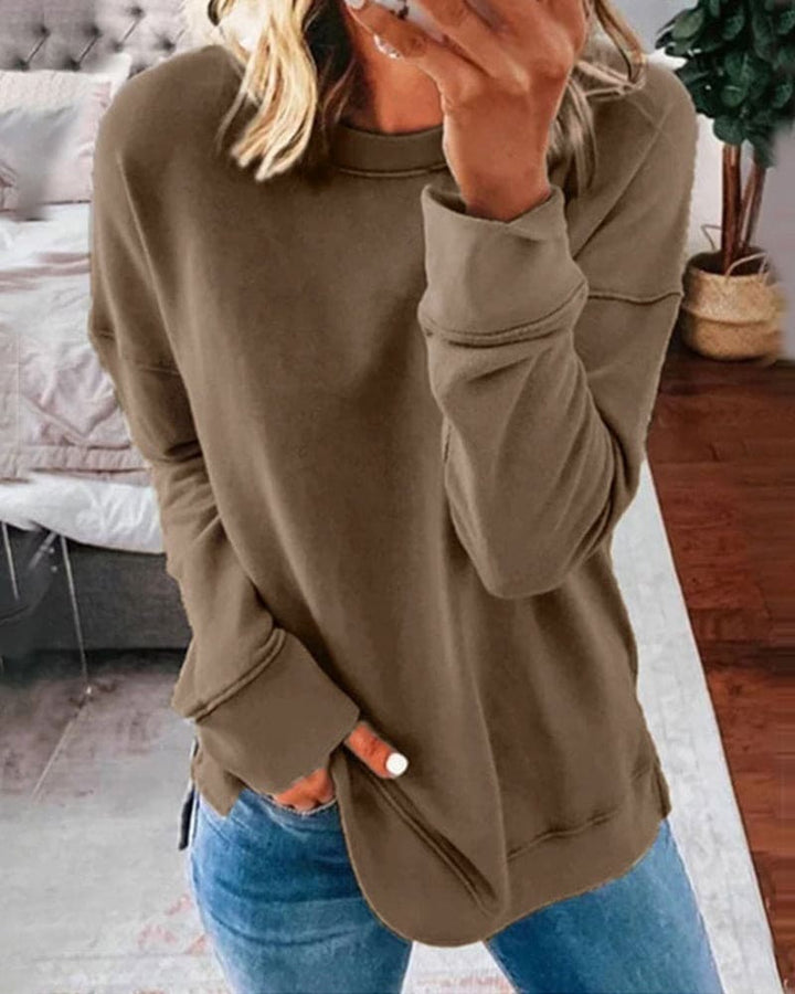 Stijlvolle effen trui voor dames, een minimalistische en veelzijdige toevoeging aan je garderobe.