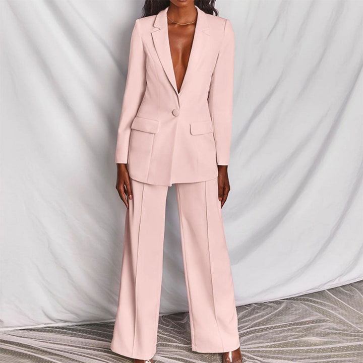 Damespak met elegante blazer en rechte broek. Perfect voor een chique en zakelijke dameslook.