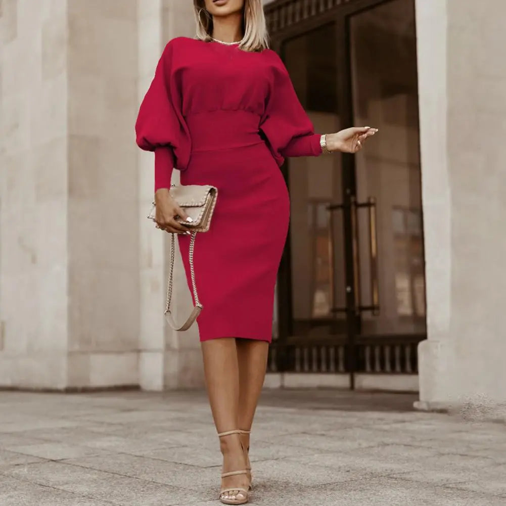 Dames elegante kantoor midi jurk met lantaarnmouwen. Perfect voor formele en casual gelegenheden.