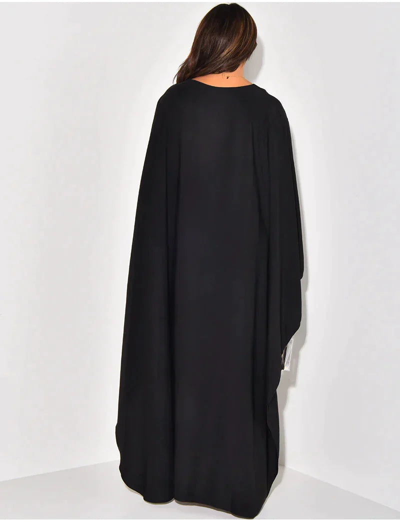 Lange dames abaya, een stijlvolle en comfortabele maxi jurk. Perfect voor feestjes of als zomerjurk.