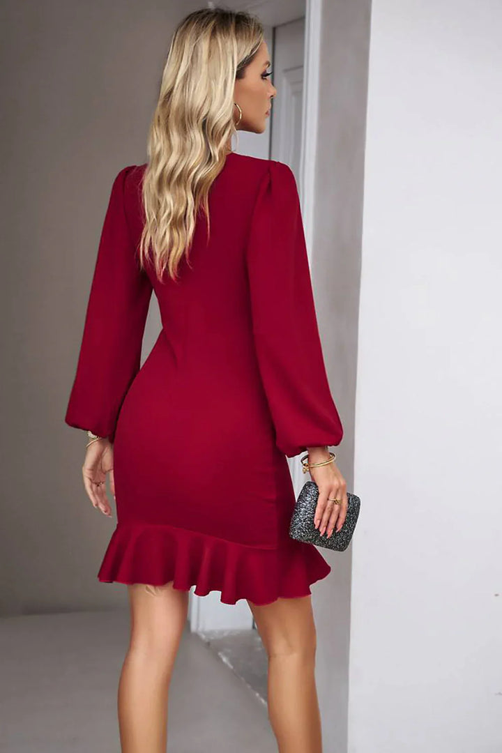 Elegante blauwe dames mini jurk, slim fit, met unieke puff mouwen en avondkleding-stijl.