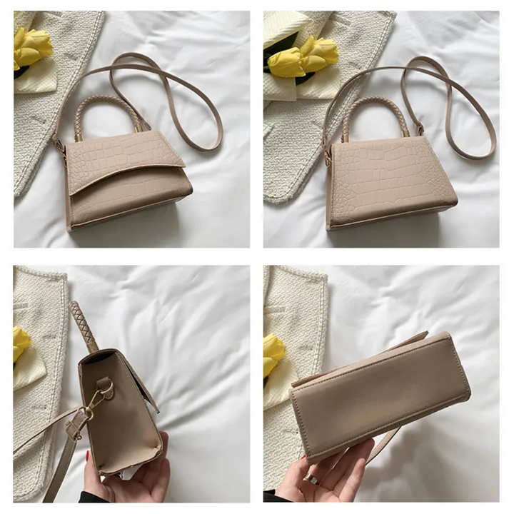 Tijdloze elegante dameshandtas in zwart, met bovenhandvat. Perfecte modieuze accessoire voor elke vrouw.