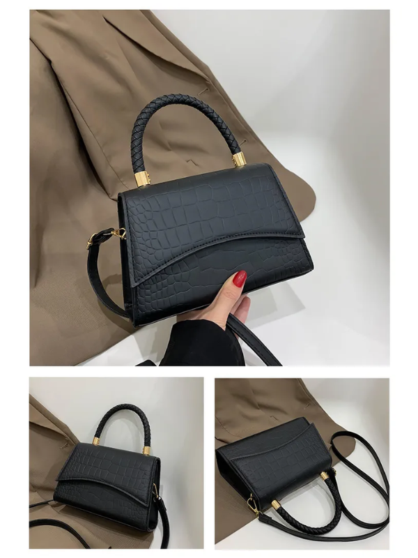 Elegante dameshandtas in zwart, perfect als schouder- of crossbodytas. Stijlvol en veelzijdig accessoire.