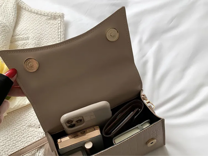 Dameshandtas met bovenhandvat, zwarte PU-leer. Modieuze crossbodytas met tijdloze uitstraling.