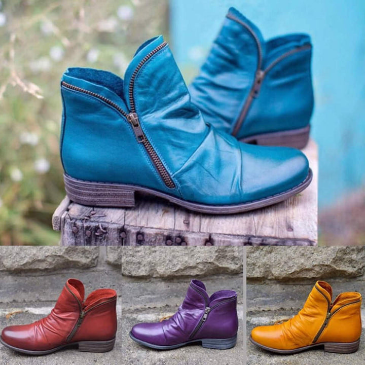 Modieuze dames enkellaarsjes met comfortabele blokhak en praktische zijrits. Ideaal voor herfst/winter mode.