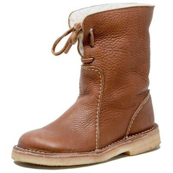 Vintage stijl dames veterlaarzen met warme voering. Modieuze en comfortabele winter enkellaarzen.
