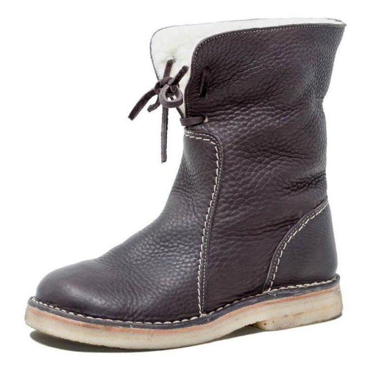 Stijlvolle dames enkellaarzen met veters. Warme voering, comfortabele winterlaarzen in vintage look.