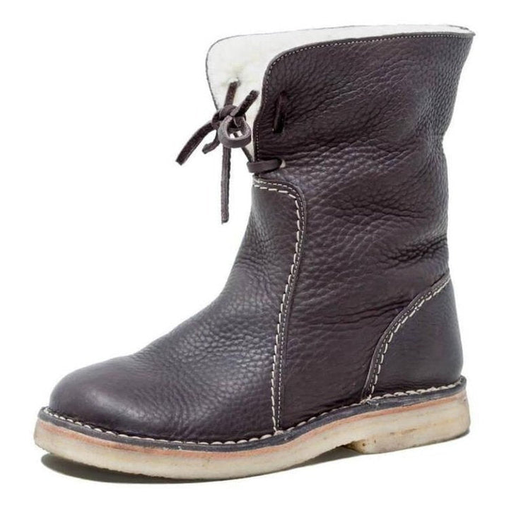 Stijlvolle dames enkellaarzen met veters. Warme voering, comfortabele winterlaarzen in vintage look.