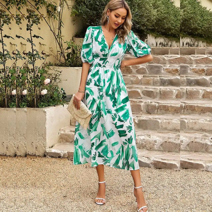 Elegante midi jurk met V-hals, ideaal als casual zomerjurk of voor feestjes.