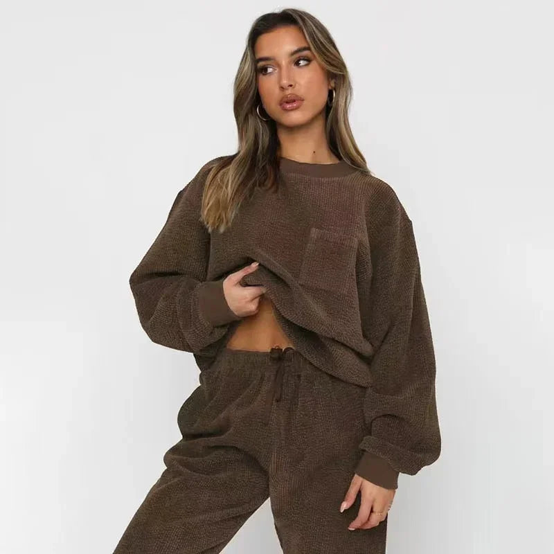 Comfortabele dames fleece jogger set met corduroy textuur; stijlvolle en warme loungewear voor thuis.