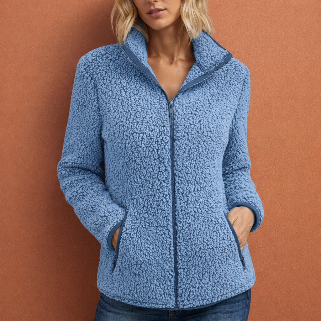 Overgangsjas dames: warm fleecevest met rits en hoge kraag voor koelere dagen.