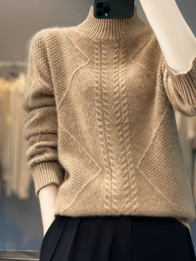 Model draagt een modieuze dames coltrui met kabelpatroon, ideaal voor winterse elegantie.