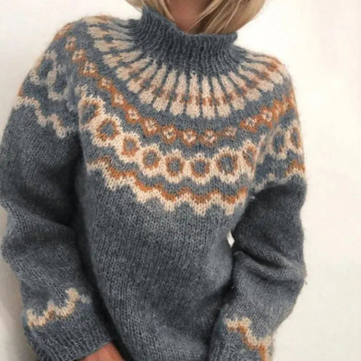 Trendy dames gebreide coltrui met uniek Scandinavisch patroon voor een warme en casual herfst-winterlook.