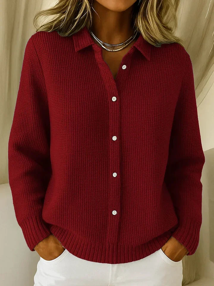 Klassieke dames gebreide polo met lange mouwen, elegante structuur en comfortabele pasvorm voor dameskleding.