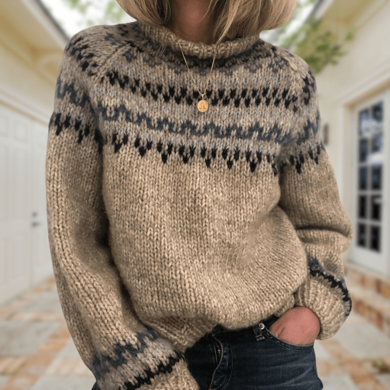 Dames gebreide trui met stijlvol Scandinavisch patroon en ronde hals, perfect voor comfortabele winterdagen.