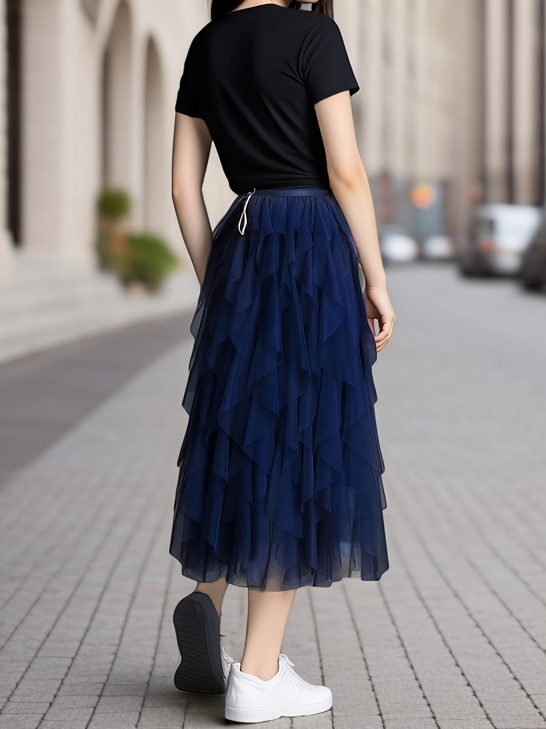 Dames maxi rok, heatherkleurig, met comfortabele elastische taille en speelse gelaagde stof voor een modieuze look.