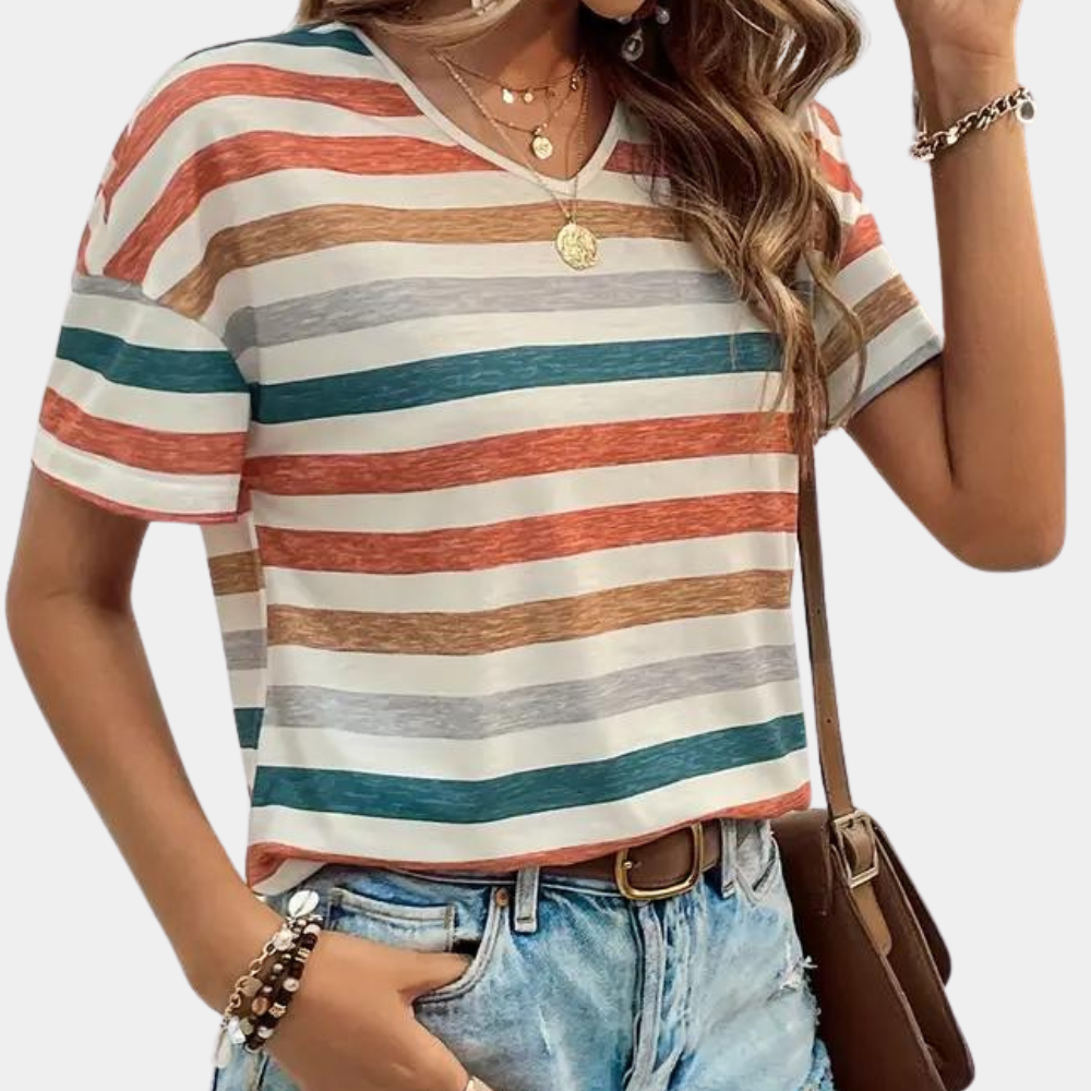 Veelzijdig gestreept dames T-shirt in oranje en groen, casual en tijdloos voor een relaxte zomerse look.