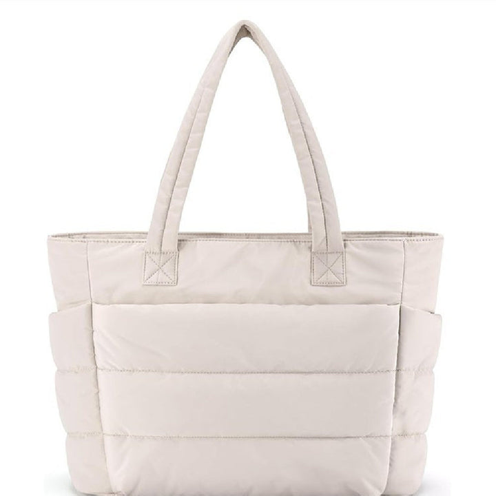 Modieuze puffer schoudertas voor dames, een trendy handtas perfect voor elke outfit.