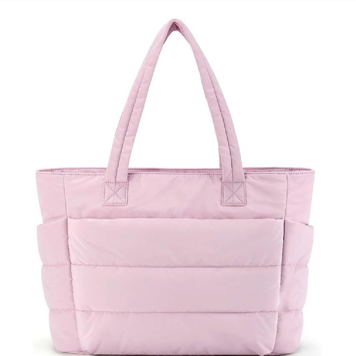Stijlvolle dames schoudertas met unieke gewatteerde puffer stijl. Trendy accessoire voor vrouwen.