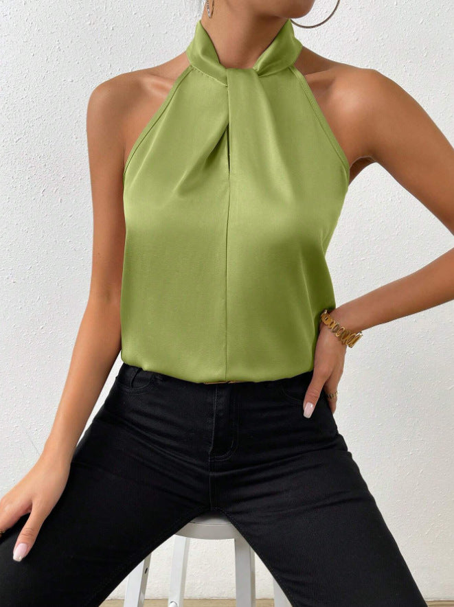 Modieuze dames haltertop voor de zomer, mouwloos met een trendy gedraaide hals. Comfortabele stijl.