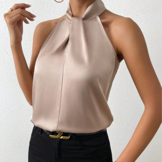 Elegante dames top: mouwloze haltertop met unieke gedraaide hals. Perfecte zomerkleding voor vrouwen.