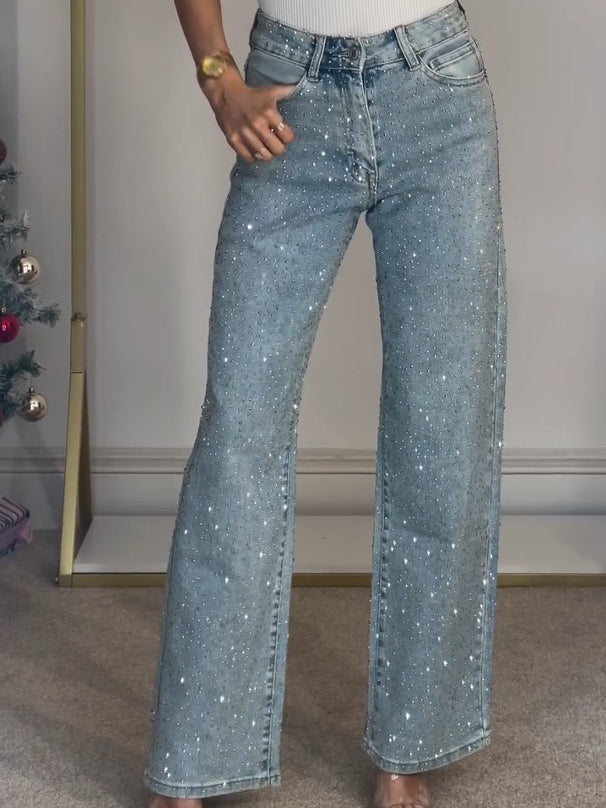 Dames hoge taille jeans met sprankelende details, een elegante pasvorm in stijlvol blauw. Comfortabele en modieuze spijkerbroek.