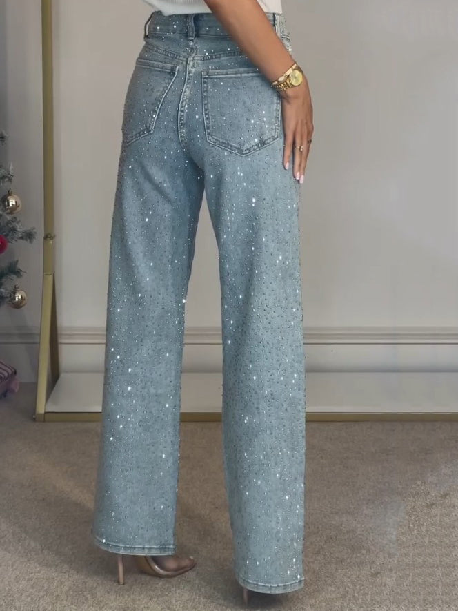 Modieuze dames hoge taille jeans met sprankelende details en een flatterende pasvorm. Comfortabele blauwe spijkerbroek.