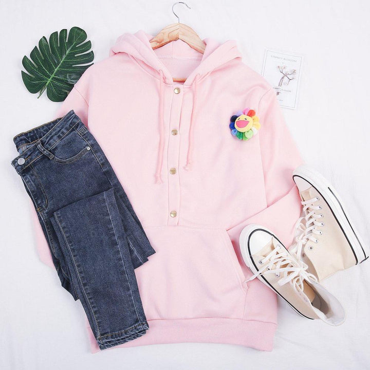 Casual roze dames hoodie met knoopsluiting, een comfortabele en trendy toevoeging aan je garderobe.