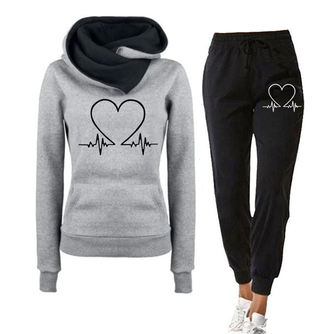 Comfortabele dames joggingpak broek en hoodie set, zacht materiaal met soepele pasvorm voor relaxte dagen.