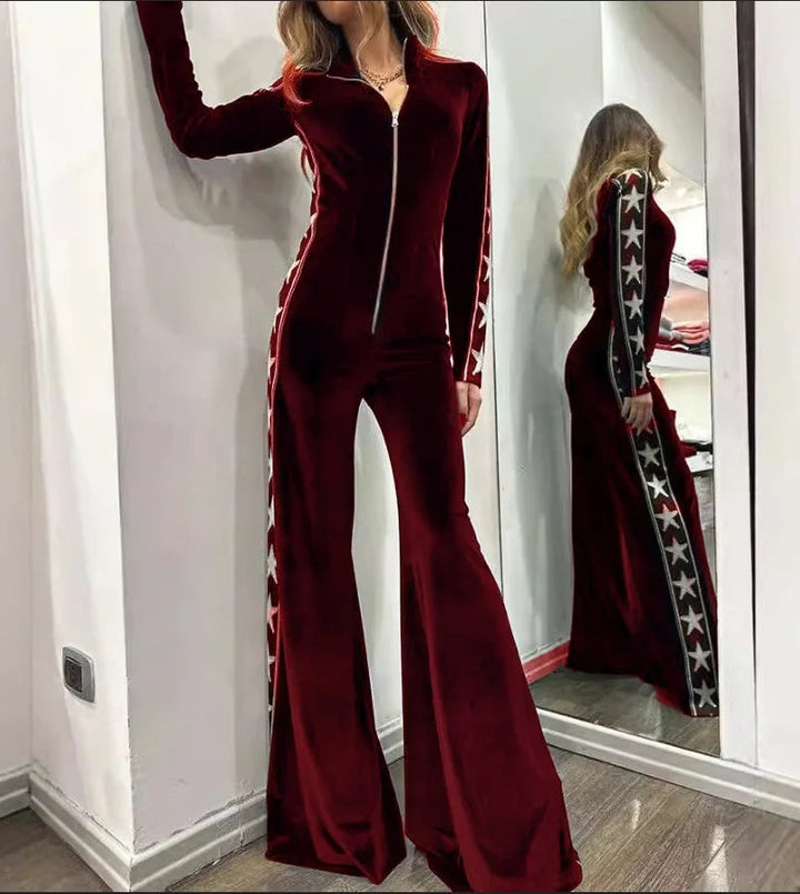 Elegante dames jumpsuit met zwierige wijde pijpen en opvallende sterrenprint, ideaal voor een feestje.